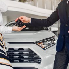 stylish-elegant-woman-car-salon_1157-20991