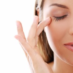 Woman with eyes closed